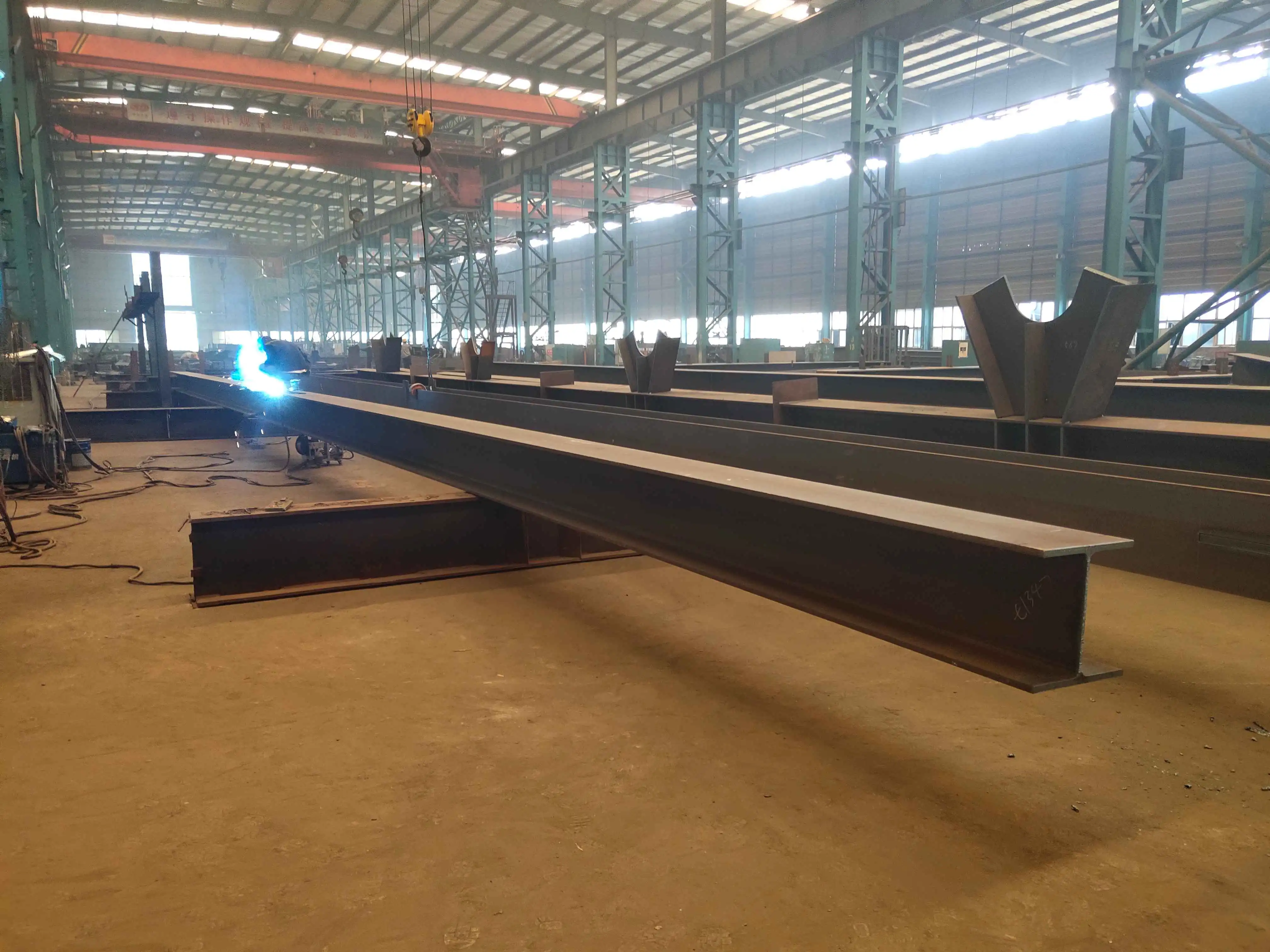 Welded H-section lattice columns